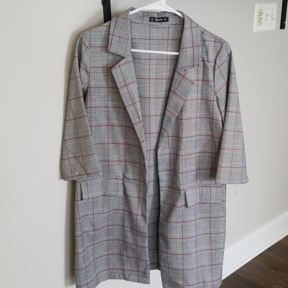 Cropped sleeve, long blazer